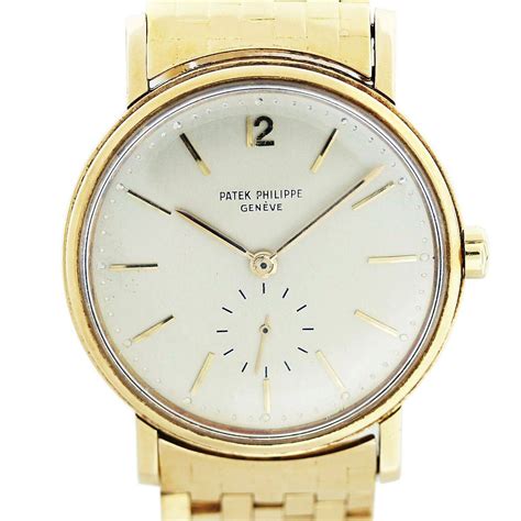 vintage patek philippe 18k yellow gold bezel watch 33mm|Patek Philippe vintage gold.